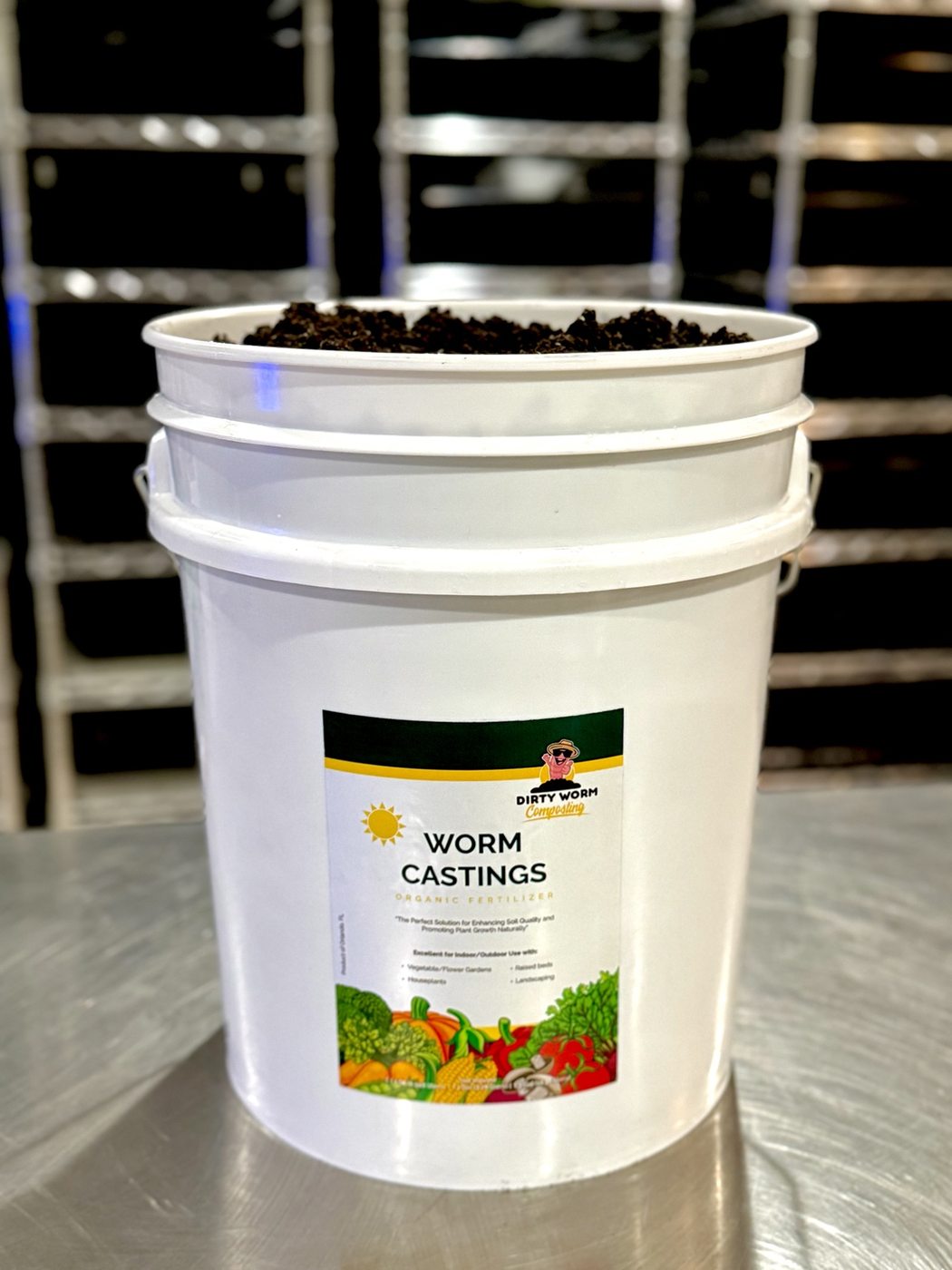 Fresh worm castings in a white bucket
